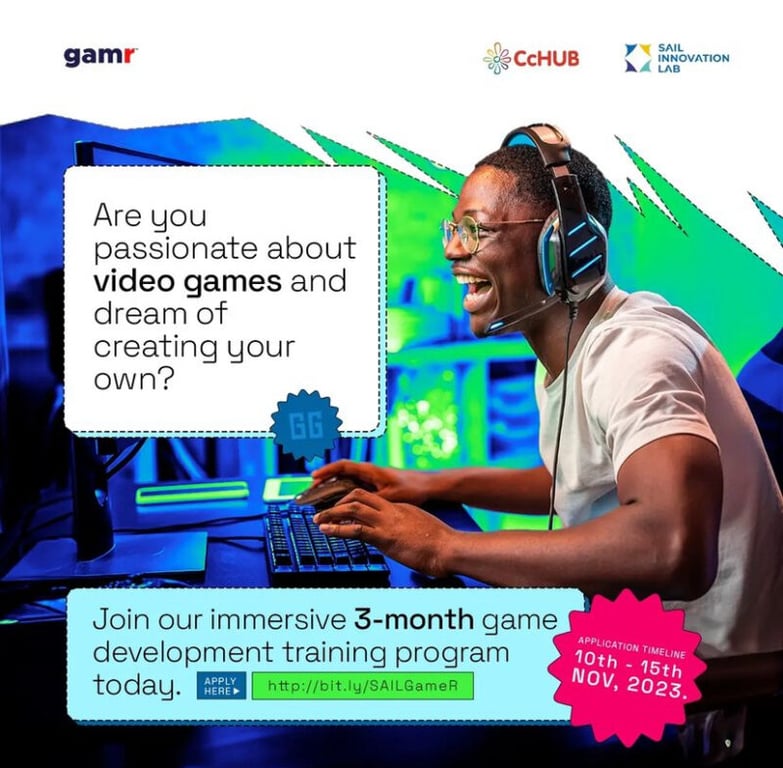 A man is smiling while playing a video game.