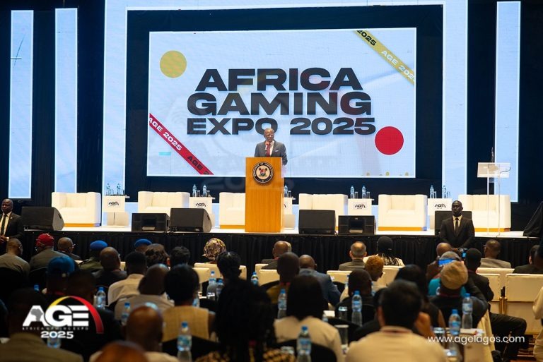 A man giving a speech at the Africa Gaming Expo 2026.